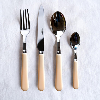 Ivory Cutlery Set of 5: A stylish assortment of kitchen utensils including a spoon, fork, and knife.