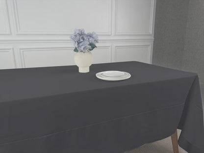 Polycotton Tablecloth with a vase of flowers on a table