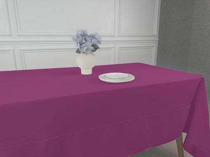 A Polycotton Tablecloth with a plate and vase of flowers, perfect for any table setting. Lightweight and reusable, available in various colors and sizes. Ideal for weddings, dinner parties, and special occasions.
