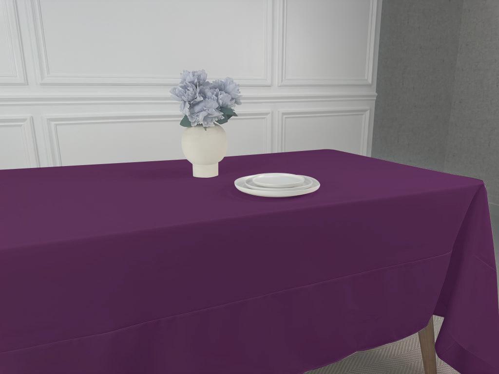 A simple tablecloth with a plate and vase of flowers. Perfect for any event or occasion. Easy to wash and reuse. Available in multiple sizes.