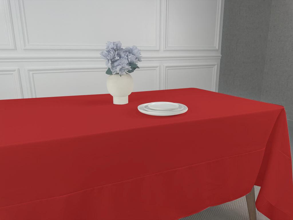 A simple, lightweight tablecloth with a white plate and vase of flowers. Perfect for any table setting. Available in various colors and sizes.