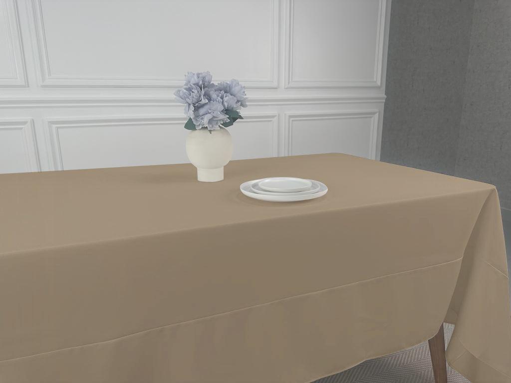A simple, lightweight tablecloth with a vase of flowers as a centerpiece. Perfect for any event or occasion. Available in various colors and sizes.