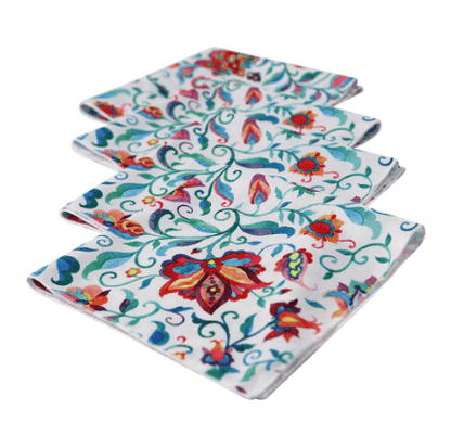 A group of elegant polyester napkins with vibrant floral designs. Perfect for adding a pop of color to any table setting.