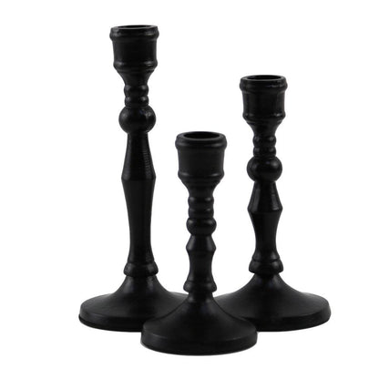 Vintage Black Candle Holder, a group of elegant and stylish candlesticks, perfect for any event, enhancing your dining experience.