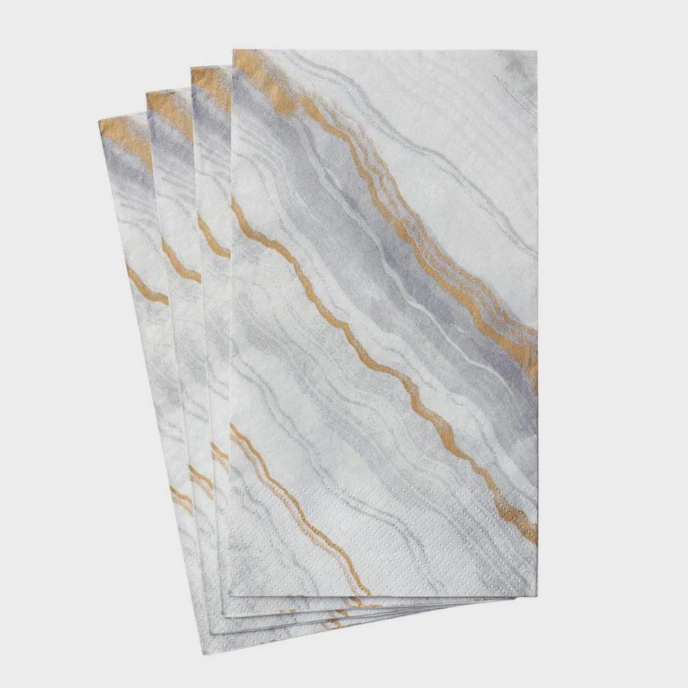 Marble paper guest towel napkins stacked.