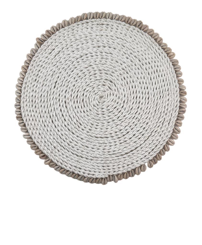 Round woven seagrass placemat with seashell accents, perfect for stylish table setups. Durable, eco-friendly, and versatile.