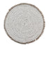 Round woven seagrass placemat with seashell accents, perfect for stylish table setups. Durable, eco-friendly, and versatile.