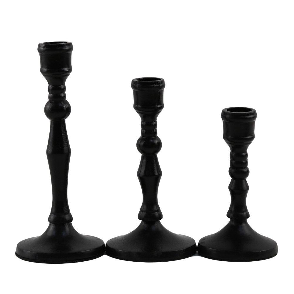 Vintage Black Candle Holder, a group of elegant and stylish candlesticks for a meaningful dining experience.
